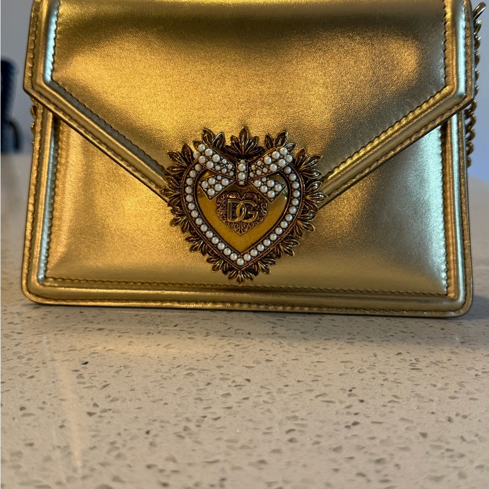 Dolce & Gabbana Gold Clutch with Heart Detail